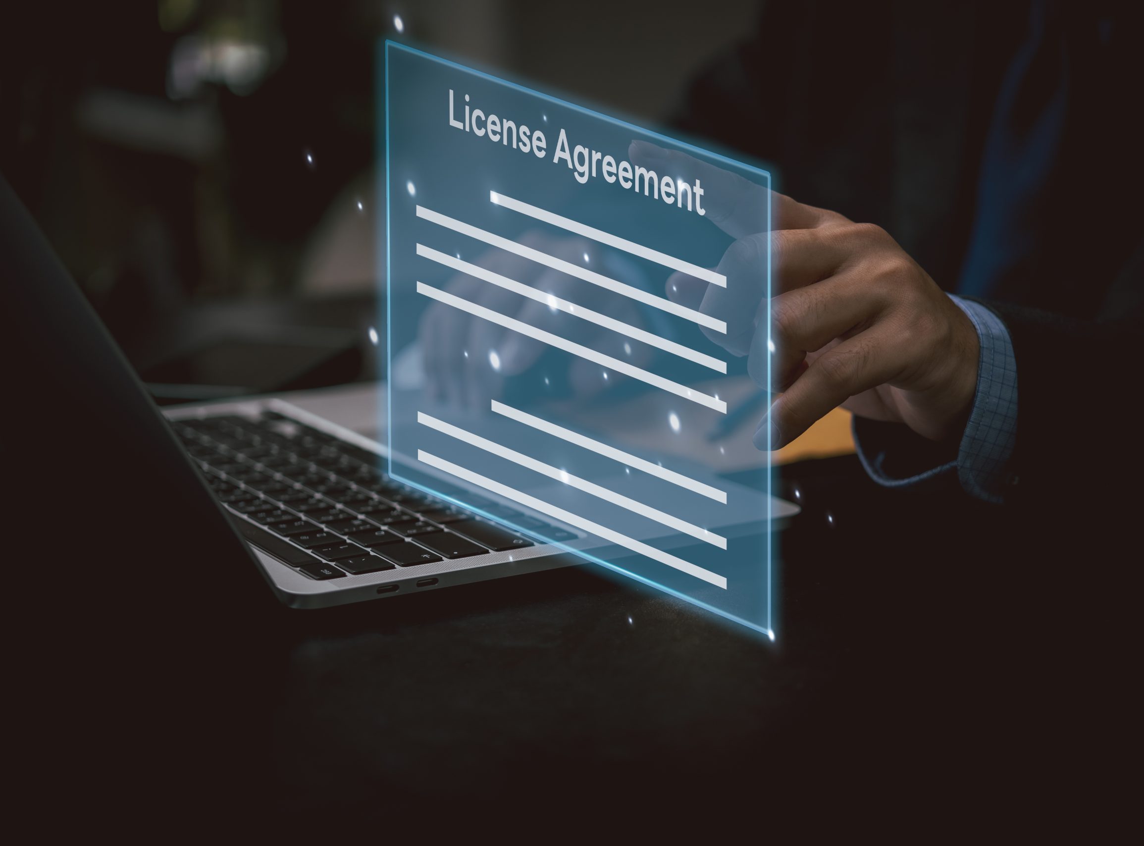 licensing agreement application online information concept businessperson using laptop